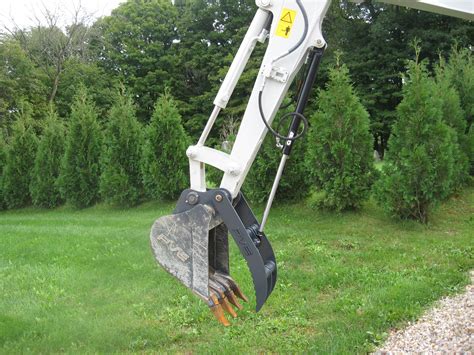 mini excavator with main pin thumb|mini excavator manual thumb.